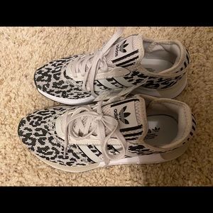 Adidas Swift Run X shoes. White cheetah
